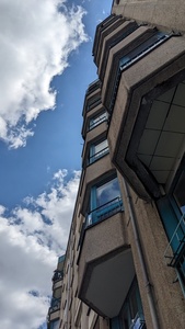 Balconies with unique 60° angles are photographed from the streets upwards to the sky