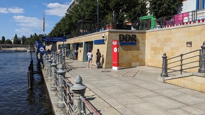 On the left side the river Spree is visible and on the right side the entrance to the DDR museum