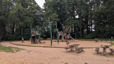 A playground for children is shown with houses reminding of old German tales like Hänsel & Gretel